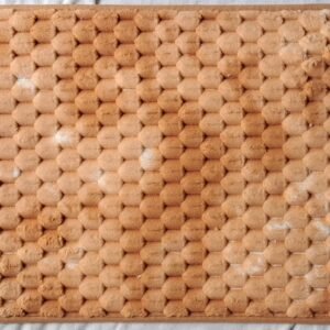 Soft honeycomb patterned bathroom mat with a plush texture and non-slip backing, ideal for bathroom use.