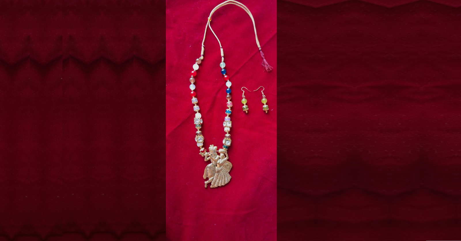 Handcrafted multicolor Radha Krishna beaded necklace with matching earrings on red background